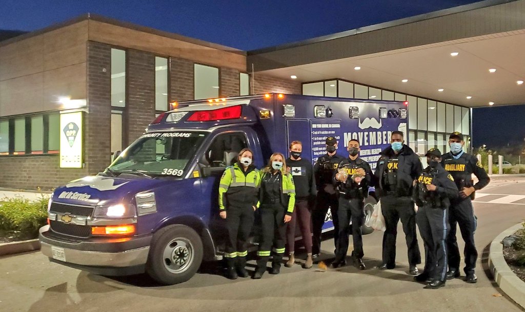 Peel Regional Paramedic Services #Movember ambulance stopped by #MississaugaOPP Detachment. Members were able to purchase baked goods with all proceeds going to support Men's Health.