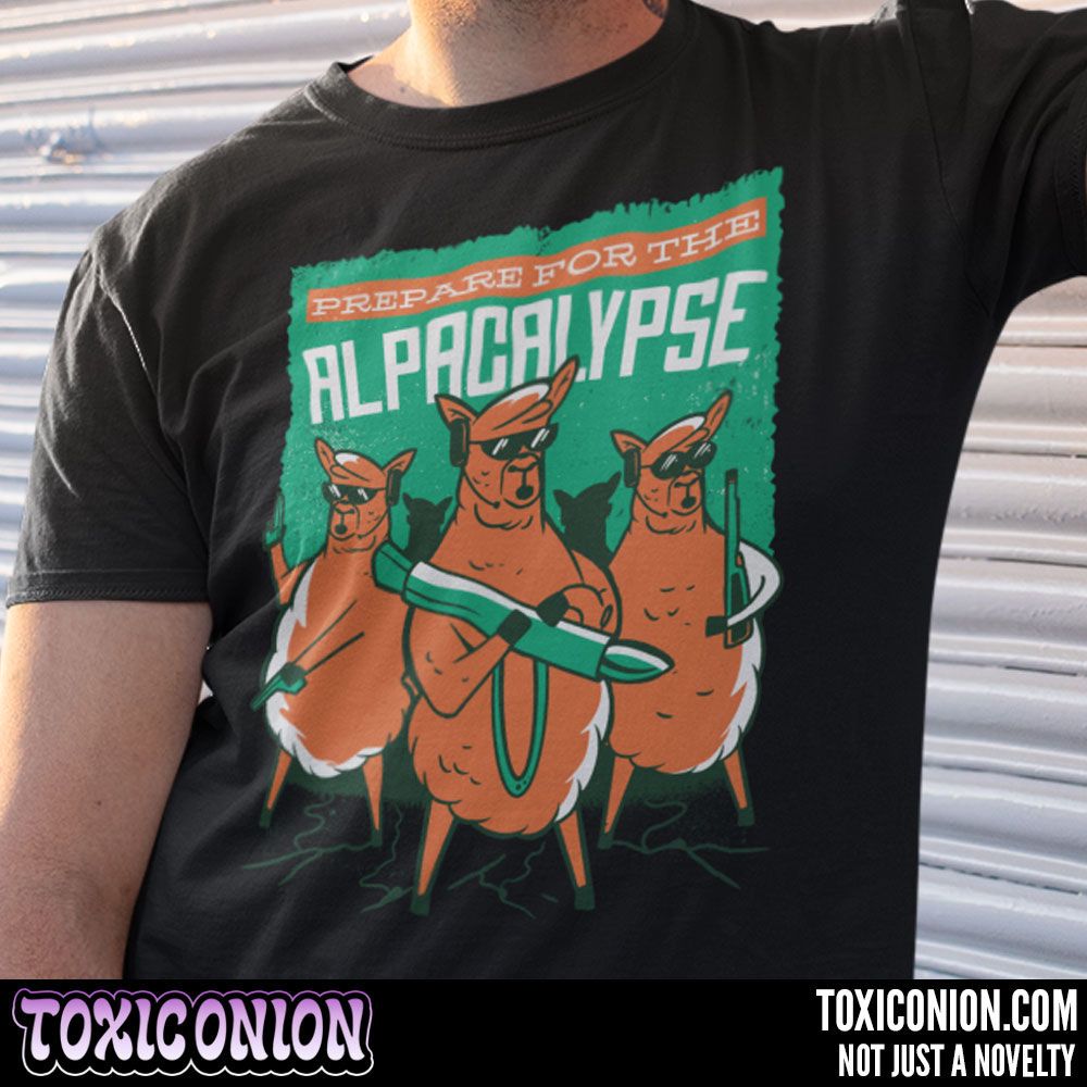 Alpacalypse. Available in men's, women's and kid's apparel, accessories and home decor. buff.ly/3wHDUHo | #ToxicOnion #Alpaca