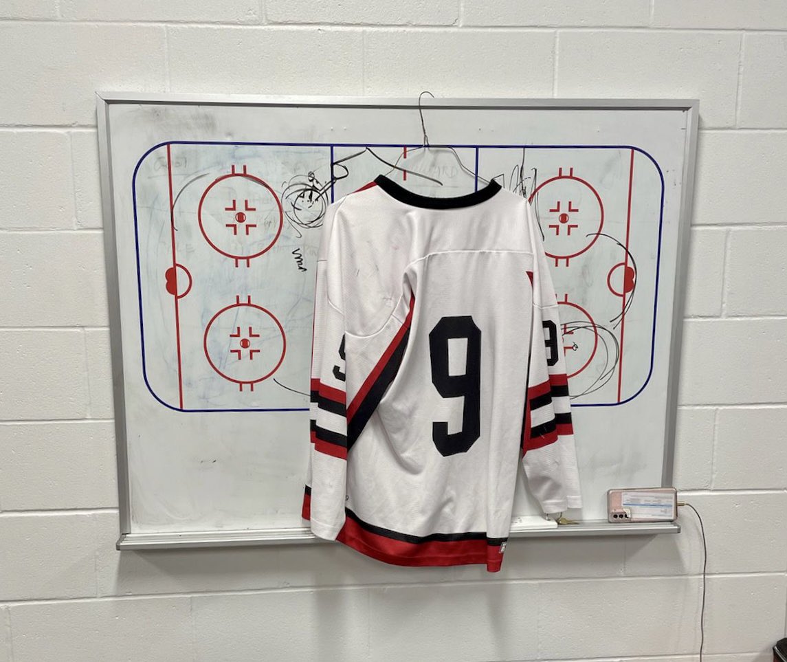What do you do when you are down a player due to medical and you know he wants to be there to contribute…the team hangs his jersey in spirit like he was there, and then you get on the ice and play to win! Speedy recovery Kaner!!!