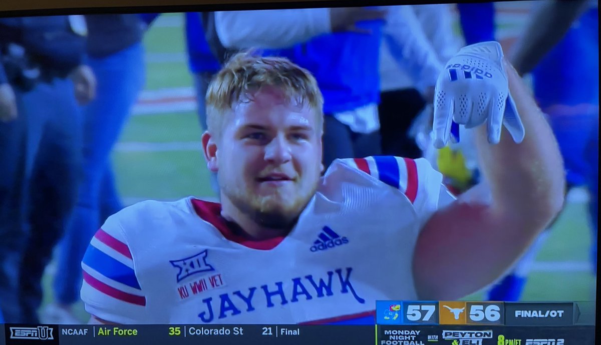 barstoolsports's tweet photo. Kansas’ win is under protest after this shocking hand sign after the game https://t.co/1kT84qJZMY