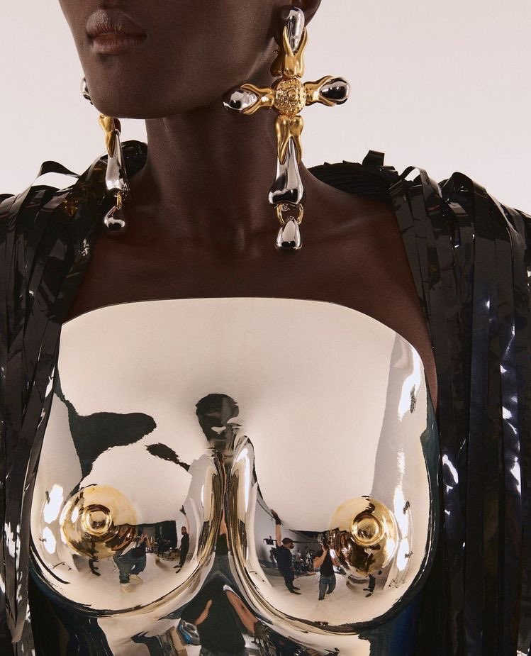 pradachurch's tweet photo. schiaparelli fall, 2021 https://t.co/8cB5Gi66Mt