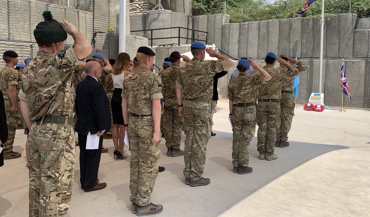 UKForcesSomalia's tweet photo. Today, alongside our friends from the British Embassy Mogadishu, we paused in remembrance, to show our respect for the fallen.                           We will remember them. @UKinSomalia #RememberanceDay #poppy https://t.co/veh4FoPhlA
