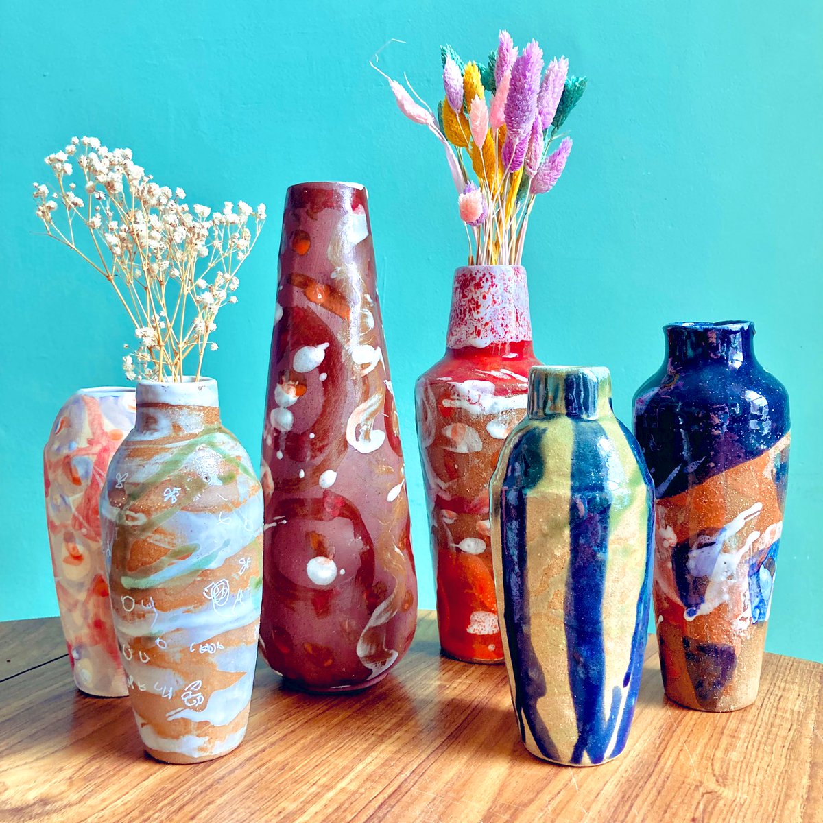 AdamCeramic's tweet photo. The vases made by Superstar Arts are available now! Check out https://t.co/poUiFsumN6 and support creative adults with learning disabilities 💛🧡 🥰 https://t.co/QXRsKihfVO