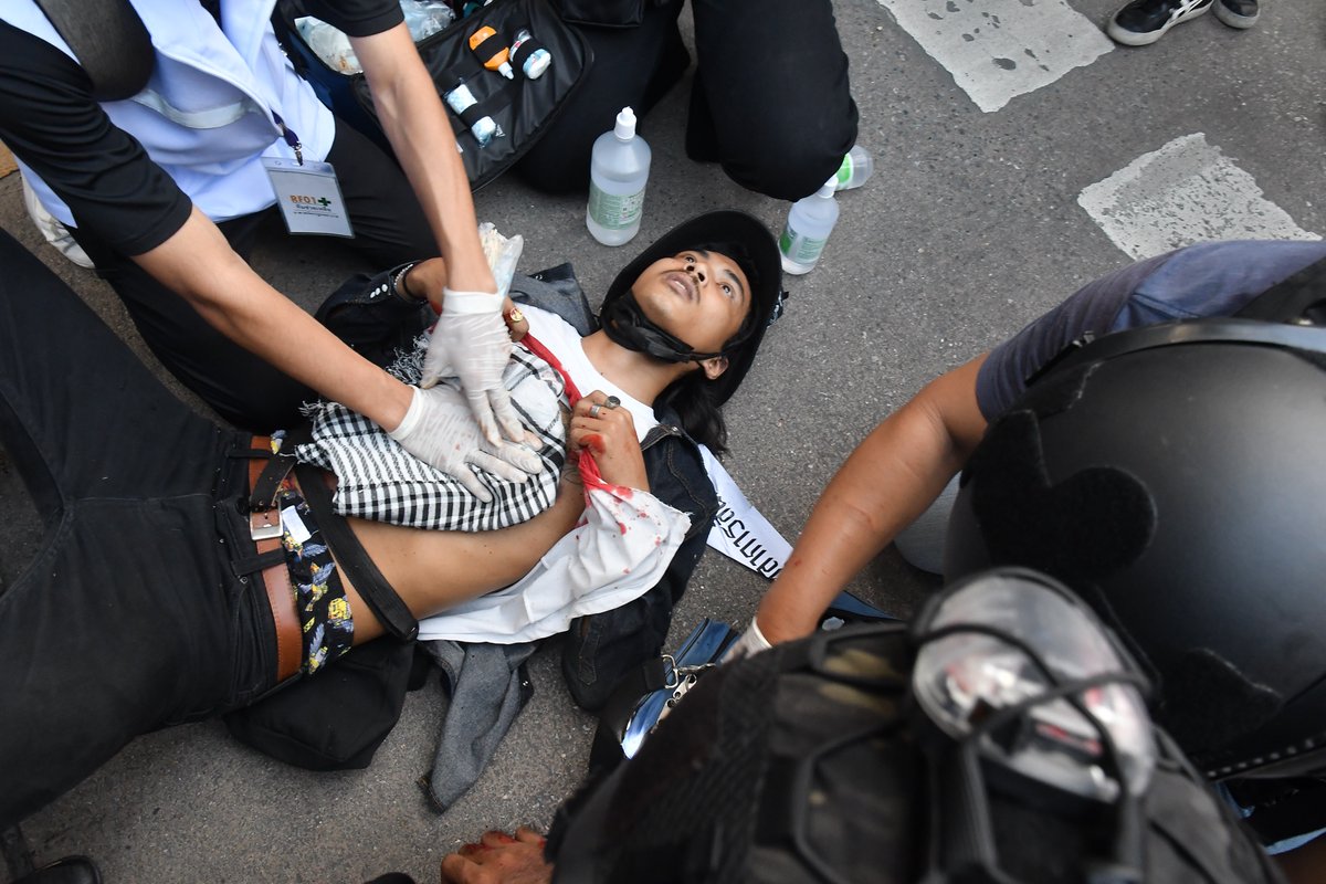 KhaosodEnglish's tweet photo. A police spokesman said the authorities are still investigating what led to the shooting that wounded 3 demonstrators during Sunday's march to German Embassy. Police have yet to say what type of bullets was used and who fired them. #ม็อบ14พฤศจิกา64 https://t.co/dCAPiNrdrL