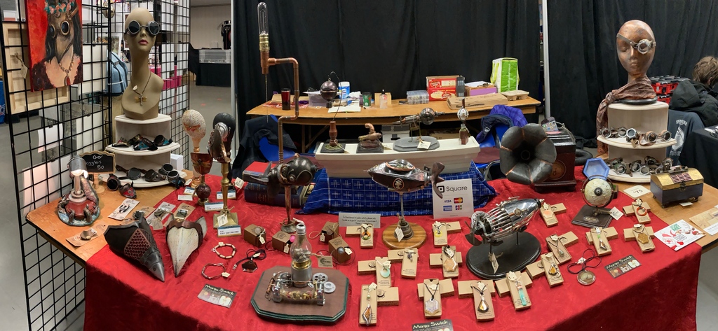 MarijoSwick's tweet photo. Wire &amp; pipes &amp; gears oh my! Visit me at the Geek Christmas Market going on at Centennial Hall till 4. Wonderful Geeky gifts #steampunk #buylocal # steamunkgift #holiday market #handmade #comiccon #londoncomiccon #airship #goggles #handmadejewellery #upcycle #repurpose #mechanical https://t.co/Ez22uROkYx
