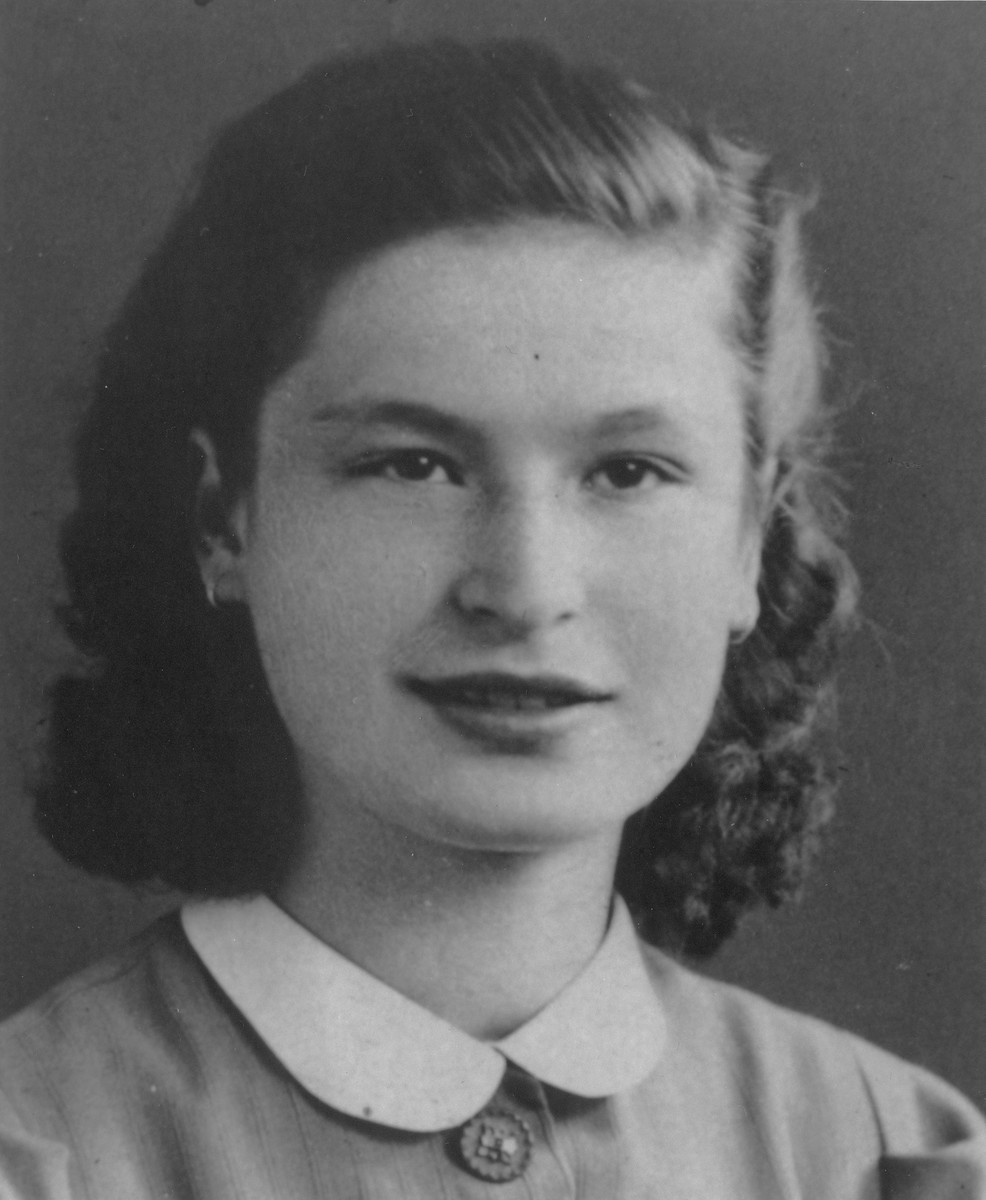In German-occupied Belgium, Frida Adler worked as a maid using a false Catholic identity. She often visited her family who was hiding under false identities in a nearby village. In 1944, her family was arrested and deported to the Auschwitz-Birkenau killing center.