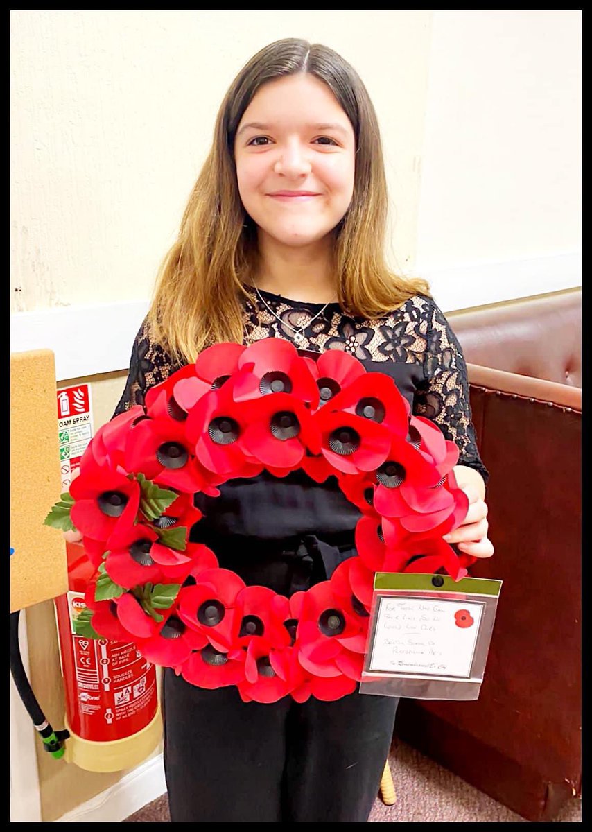 BSPAUK's tweet photo. Junior Student Lily Clark laying the wreath today for Remembrance Sunday from The Warmley Community Centre. Thankyou to Lily &amp; her mum Mel Clarke for representing BSPA on this special day. 
We have been invited next year to bring BSPA “Voicecraft Choir” to sing at the ceremony. https://t.co/9GnQlDCWbl