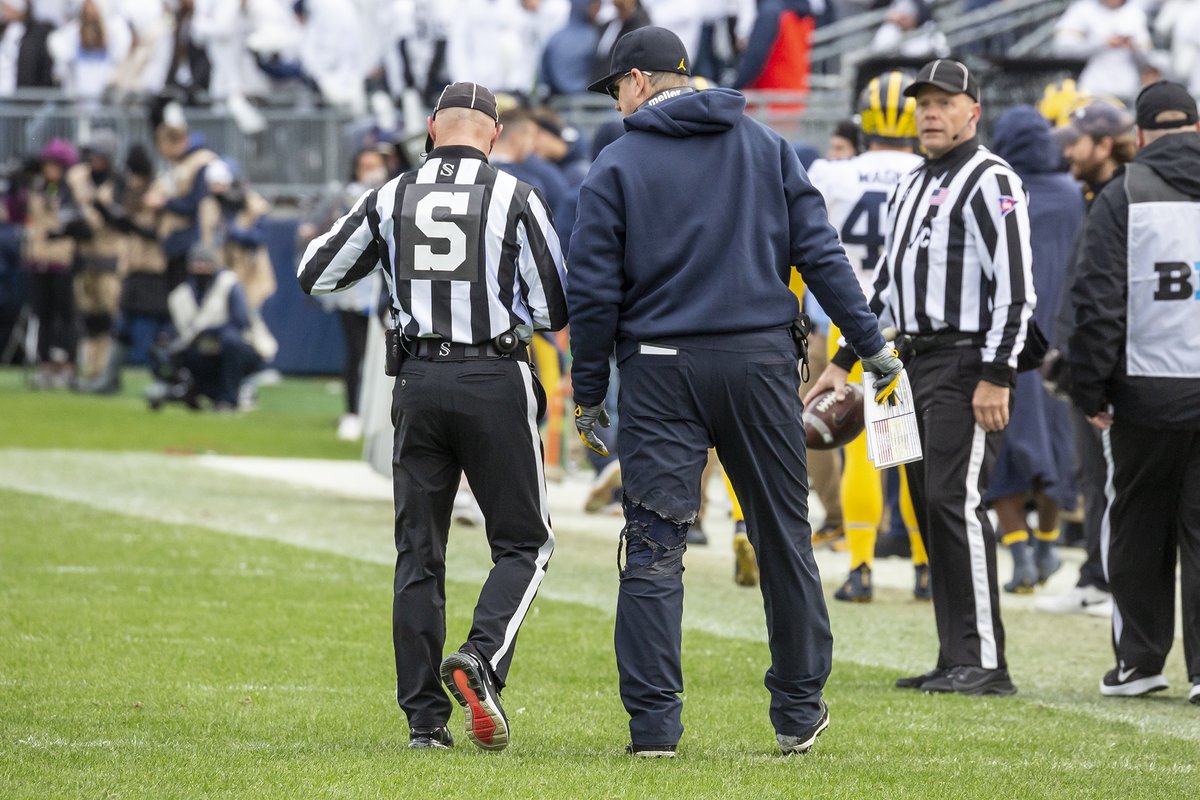 BlueBarronPhoto's tweet image. Jim Harbaugh's pants got burned by the space heater on the sidelines in the 1st half