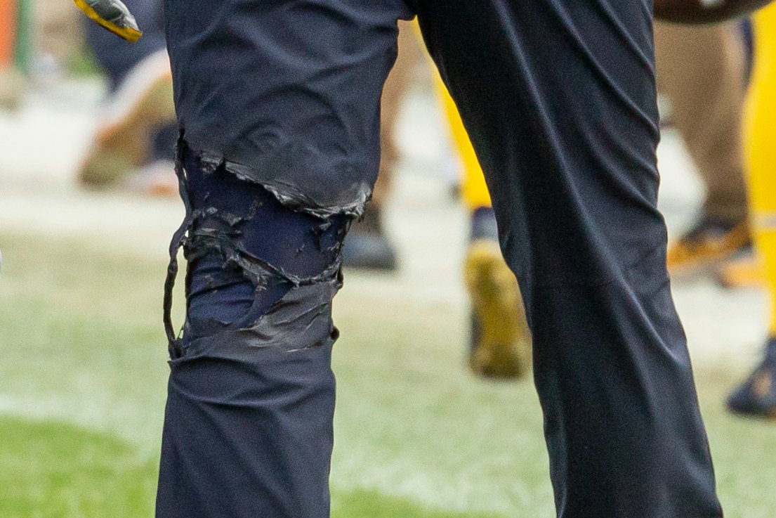 BlueBarronPhoto's tweet image. Jim Harbaugh's pants got burned by the space heater on the sidelines in the 1st half