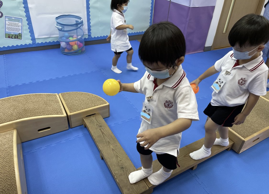 Pre-K students have been improving their gross motor skills, balance and confidence by traversing wooden blocks and other obstacles #AnfieldSchoolHK #KowloonTong #Kindergarten #PE