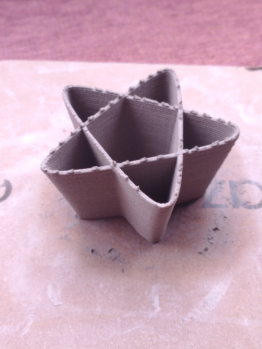 kitwallace's tweet image. #makevember printing in clay now!  castlation thanks to an air bubble
