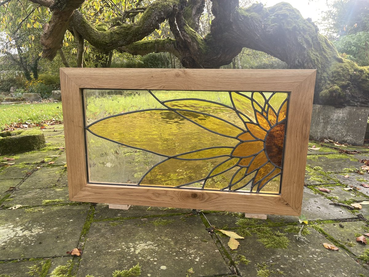 Ir8Bespoke's tweet photo. Recently a customer came to me with a stained glass panel a friend had made for their previous house but had been sat in storage since the move. 

I framed it in a solid oak frame with mitred joints wedged with slips of sapele to help the accent, then hand oiled with serval coats https://t.co/e5Gs1raorr