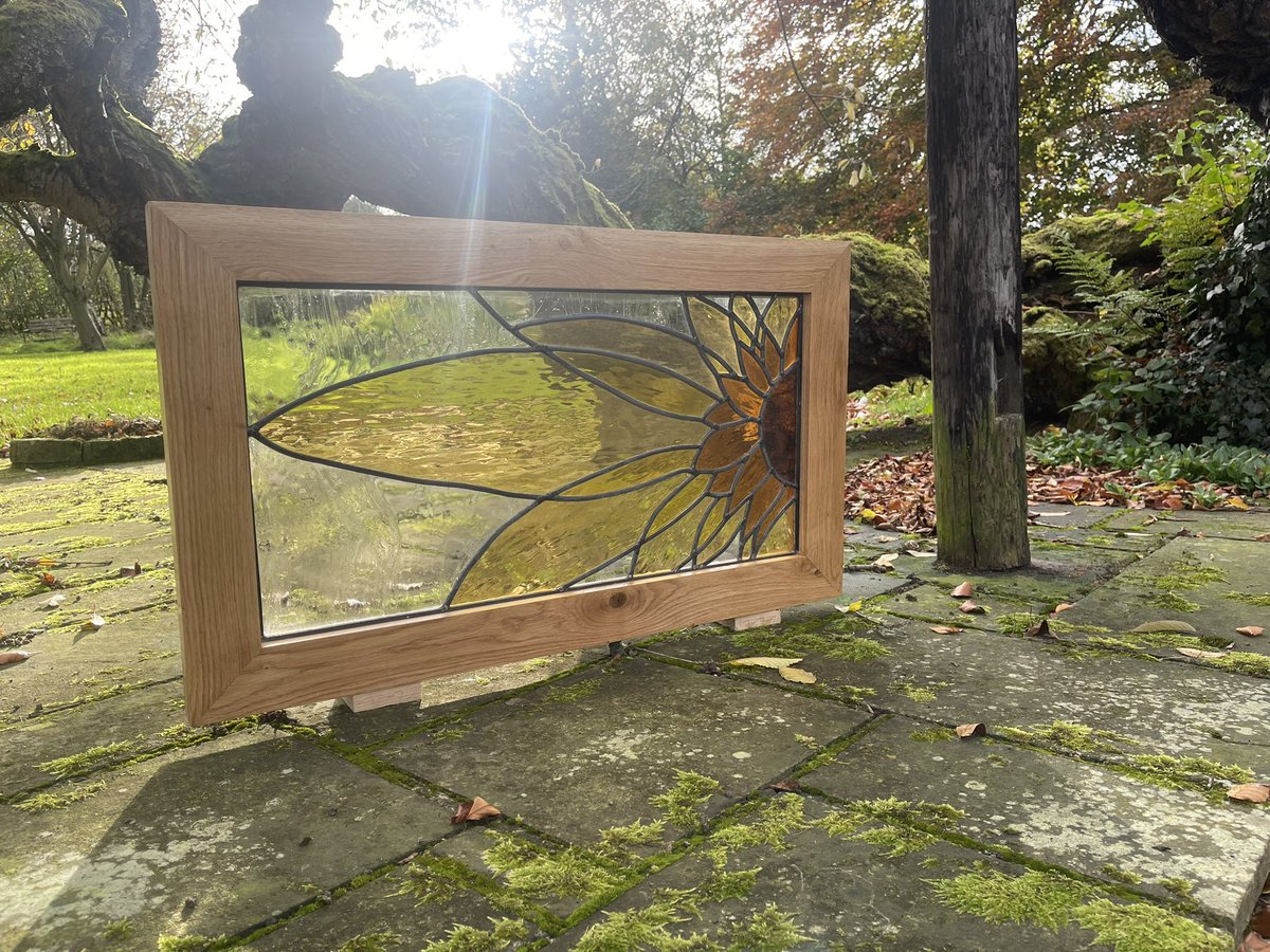 Ir8Bespoke's tweet photo. Recently a customer came to me with a stained glass panel a friend had made for their previous house but had been sat in storage since the move. 

I framed it in a solid oak frame with mitred joints wedged with slips of sapele to help the accent, then hand oiled with serval coats https://t.co/e5Gs1raorr