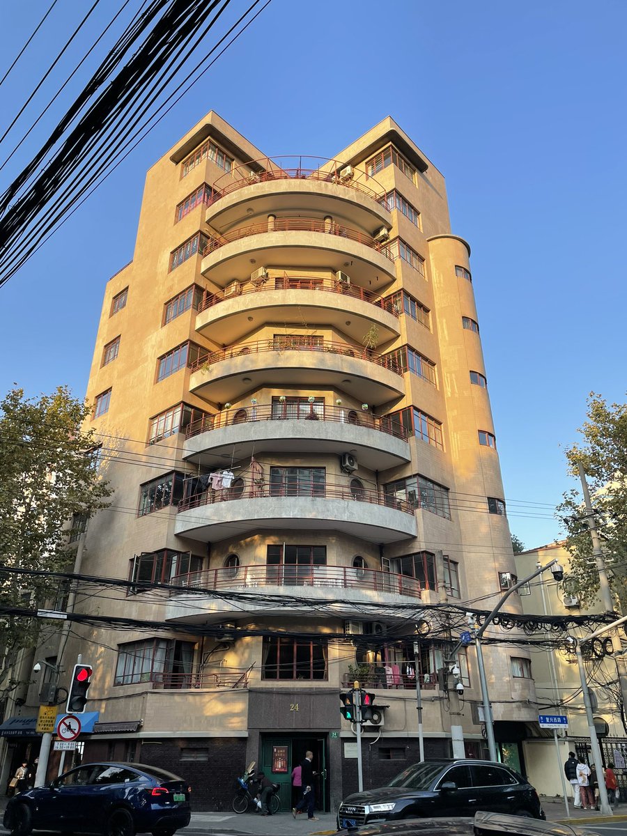 A golden #PortholeMonday, as the setting sun’s rays gild the #Magy Apartments (Leonard, Veysseyre &amp; Kruze, 1936), on the corner of Fuxing / Wulumuqi (Rte Boissezon / Magy). #ArtDeco