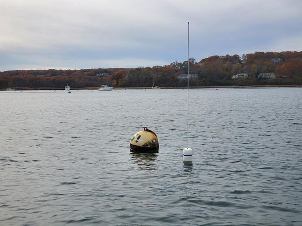 The boom is down the mast unstepped and the boat waits at the dock to be hauled out for the winter. I make one more trip out to the mooring to remove the pickup stick. Tis the end of the sailing season.