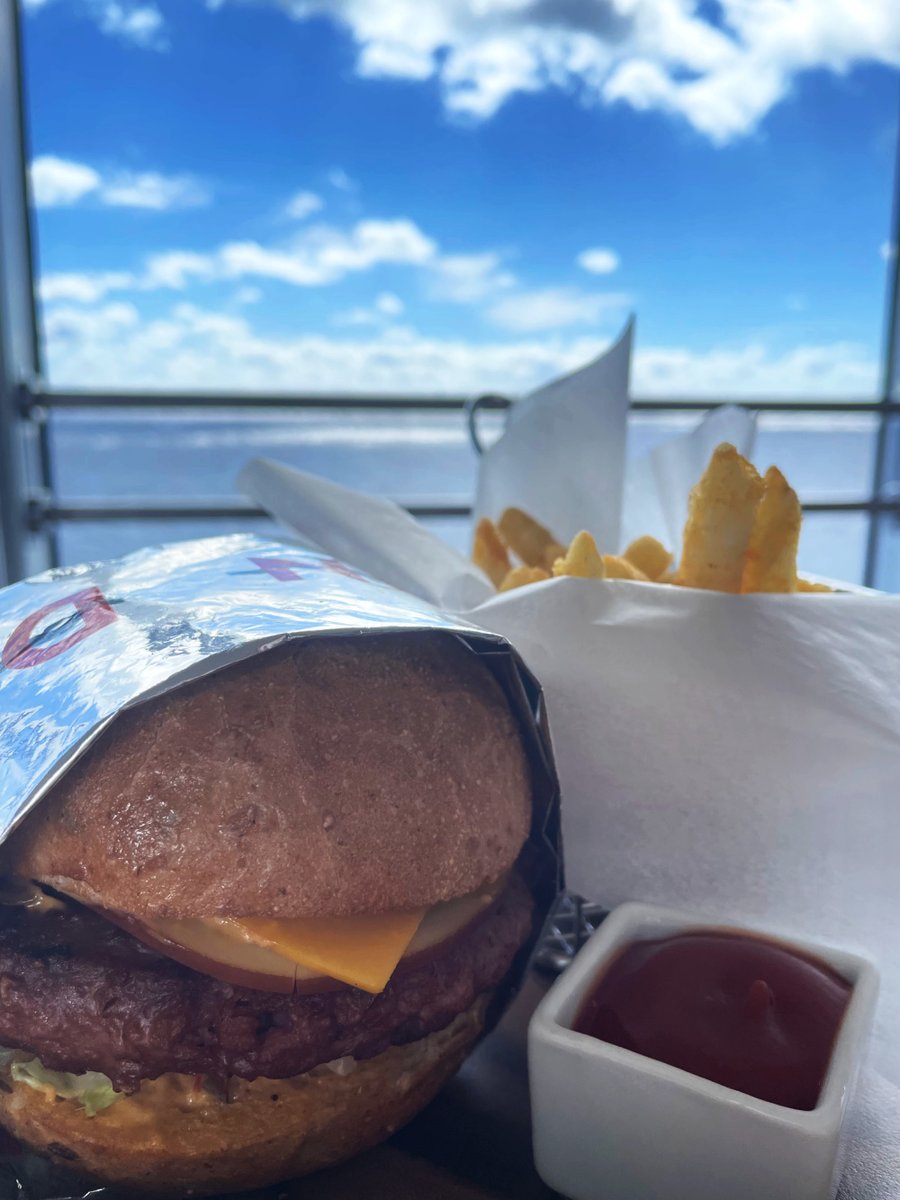 HALcruises's tweet photo. #DidYouKnow that at Dive-In, we serve @BeyondMeat? You can get any style with a Beyond patty! This is the "Freestyle" topped with cheddar and Gouda cheese, chop-chop lettuce salad, avocado and sliced tomato with Dive-In Sauce! #MeatlessMonday #MealWithAView https://t.co/AFNFB2Wx8h