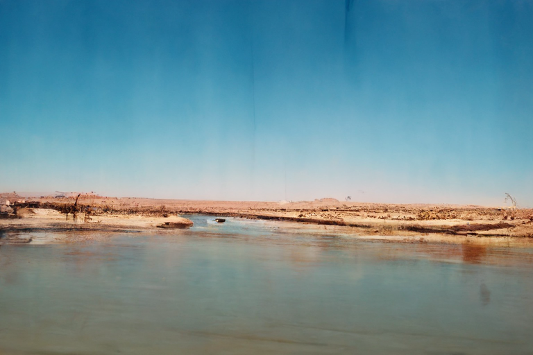 RiversHaveWings's tweet photo. Prompt: "a wide river running through the desert, Provia, Velvia" (CLIP guided YFCC diffusion, 968M parameter model, it's not done training yet) https://t.co/64bX2tacUC