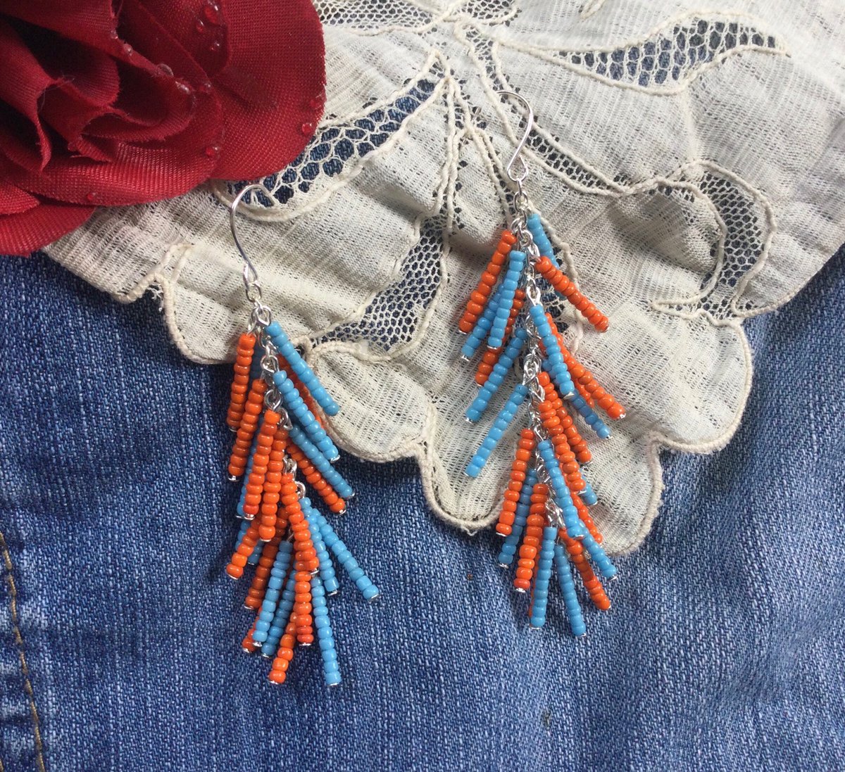 Excited to share the latest addition to my #etsy shop: #OrangeEarrings $9.95 with #freeshipping. More #holidaygift items in our shop most under $20. #SeedBeadJewelry #LongEarrings #LightweightEarrings #FunkyDangleEarrings #GiftforHer #BlueJewelry #momgift etsy.me/3CkRdyR