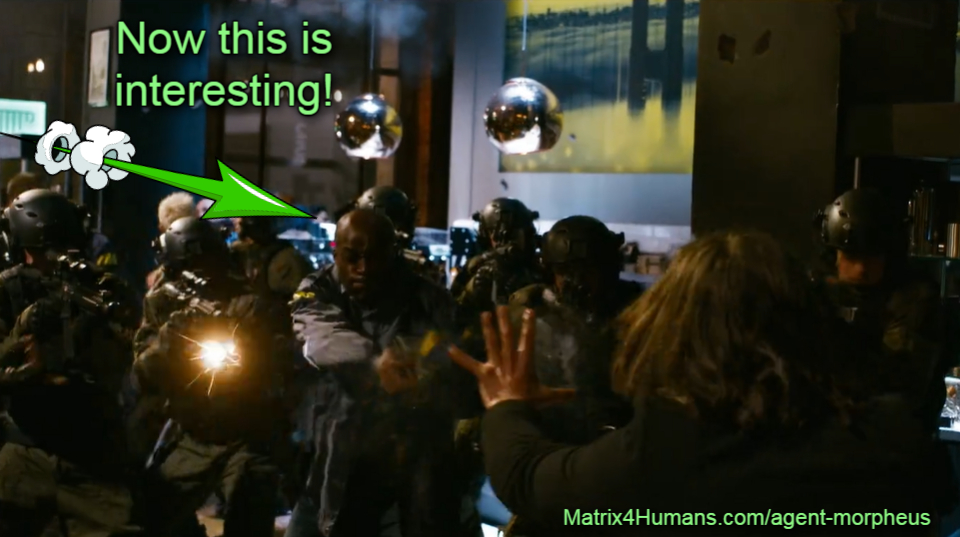 Matrix4Humans's tweet photo. Who does that look like, pointing a gun at Neo? A split-second still from the red-blue pill pre-trailer teaser. Don't jump to conclusions though! Things are not what they appear to be in the Matrix. https://t.co/5eWA4JtgS1 #Matrix4Humans #TheMatrixResurrections https://t.co/X8MdZtMnhQ