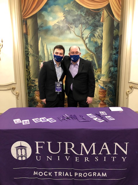 Our partnership with <a href="/EmpireMockTrial/">Empire</a> has come full circle for Christian Mancino ’24. Christian was an Empire competitor in high school, which led him to Furman’s #TopMock and <a href="/FUMockTrial/">Furman Mock Trial</a>. He returned to Chicago with Dr. HN to serve as assistant director of Empire's tournament.