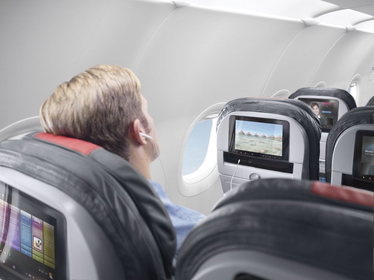 JTGenter's tweet photo. American Airlines has yanked all inflight entertainment screens out of its 737 fleet, and it's almost done doing so on its (non-transcon) A321s.

So, it's pretty misleading that all @americanair media images of domestic economy seats still include inflight entertainment screens🤔 https://t.co/E9EIZZoDkc