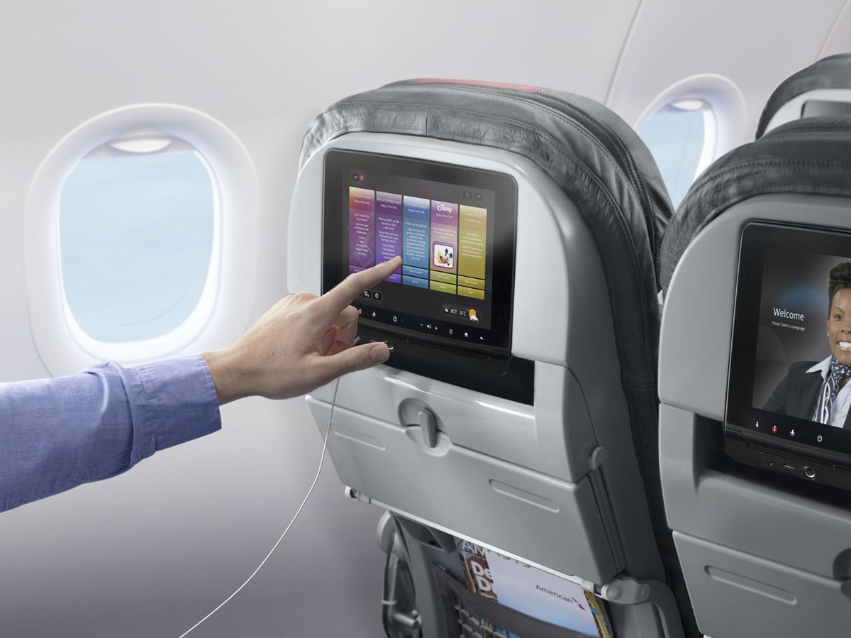 JTGenter's tweet photo. American Airlines has yanked all inflight entertainment screens out of its 737 fleet, and it's almost done doing so on its (non-transcon) A321s.

So, it's pretty misleading that all @americanair media images of domestic economy seats still include inflight entertainment screens🤔 https://t.co/E9EIZZoDkc