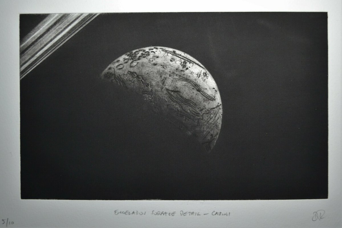 The ice bright Enceladus, a moon of Saturn, hangs under the gas giant's rings as the dark moon of Titan looms in the background. 1 of 3 hand made copper plate prints. Price discounts PayPal ready visit iamthehow.com/store #christmaspresents #handcrafted #printing #solarsystem