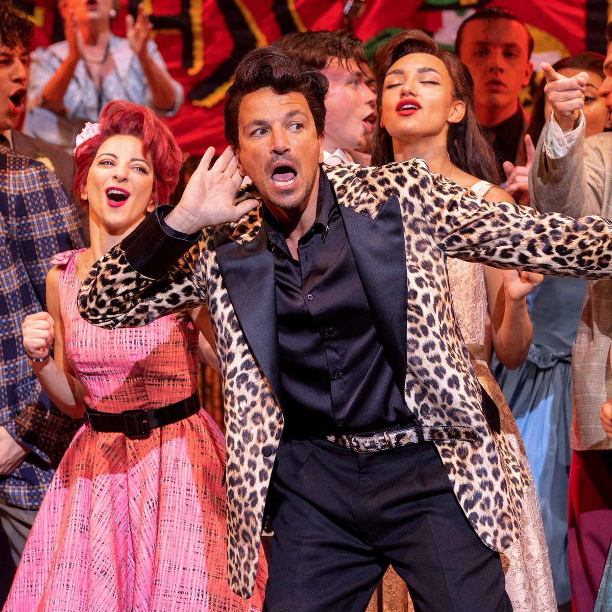 LiverpoolEmpire's tweet photo. 🎉 LIVERPOOL...GREASE IS THE WORD! 🎉

@greaseuktour opens TONIGHT and we can't wait! 🥳

Let Danny, Sandy, Rizzo and @MrPeterAndre's Teen Angel/Vince Fontaine take you back to Rydell High for a night to remember! 🎈 Performing until Sat 20 Nov 2021! 🎟️ https://t.co/hV9ksdSRkb https://t.co/HYp1MB50AE