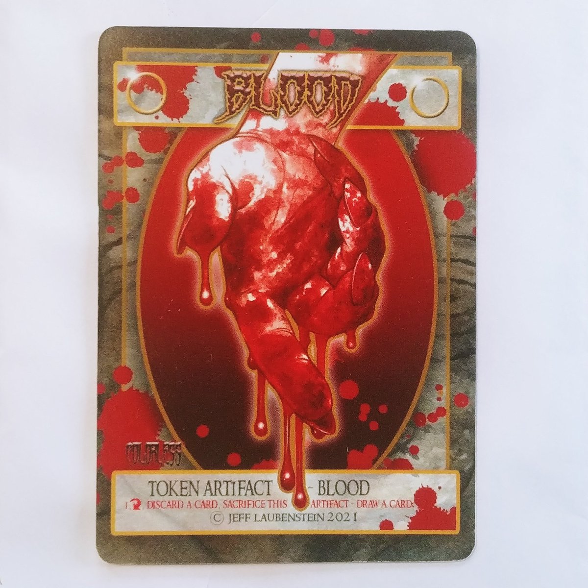 IllustratorJeff's tweet photo. Hello #MTG folk. If you are headed to Vegas this week, I've got a brand new #BloodToken, a Metal as heck #SpiritToken and should have a world premiere #GoblinFestival stitched playmat. #MTGVegas. Check them out! https://t.co/Ob9AGwd215
