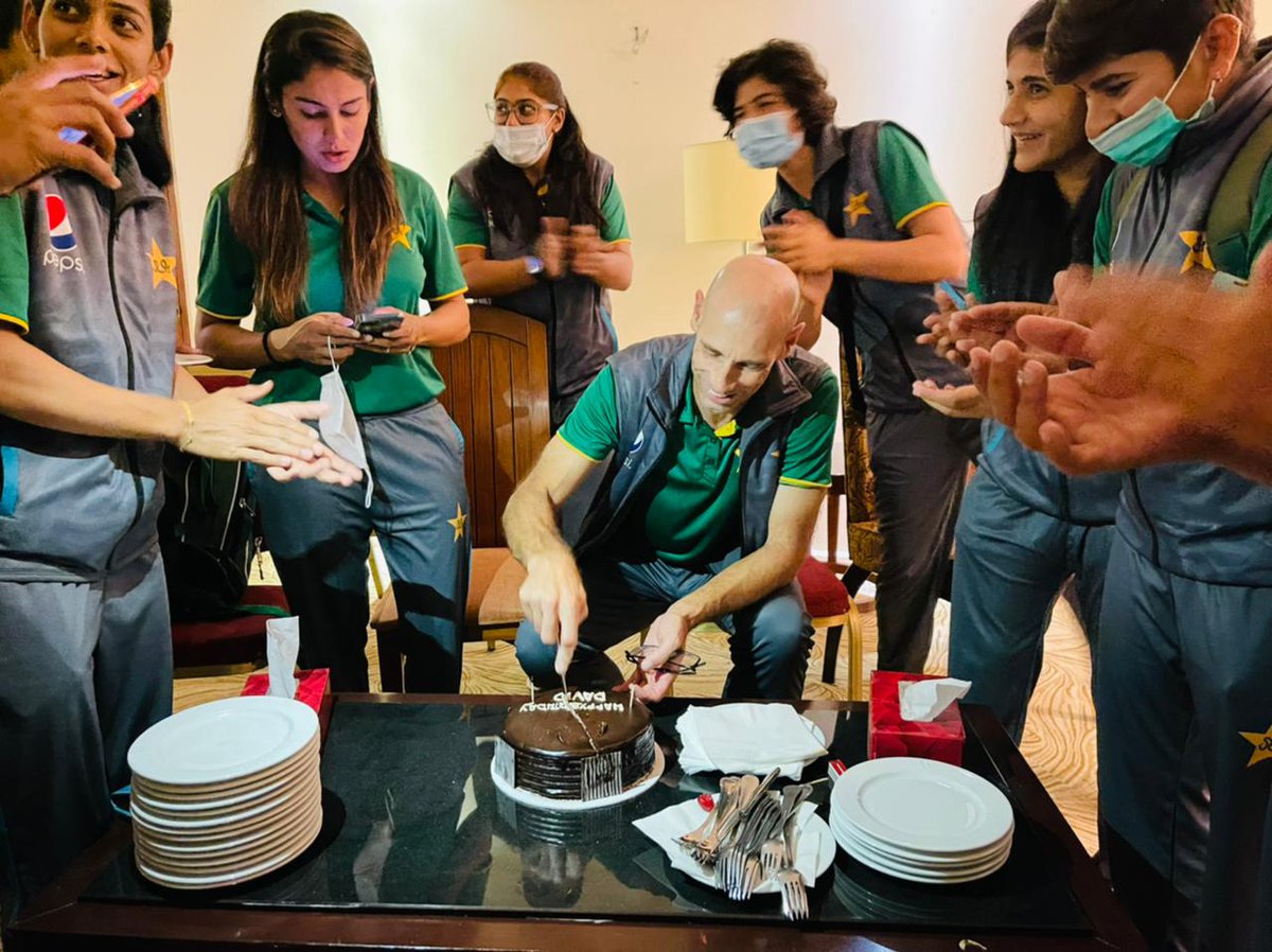TheRealPCB's tweet photo. Before their departure for World Cup Qualifier in Zimbabwe, our women's team celebrated the birthday of their coach David Hemp 🎉🎂 https://t.co/1kbBviaicq