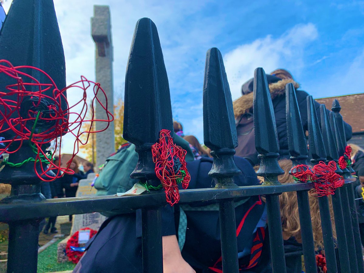 Wire poppies made by Art students <a href="/MersthamPark/">Merstham Park School</a> installed at Merstham memorial with members of the local #britishlegion #lestweforget