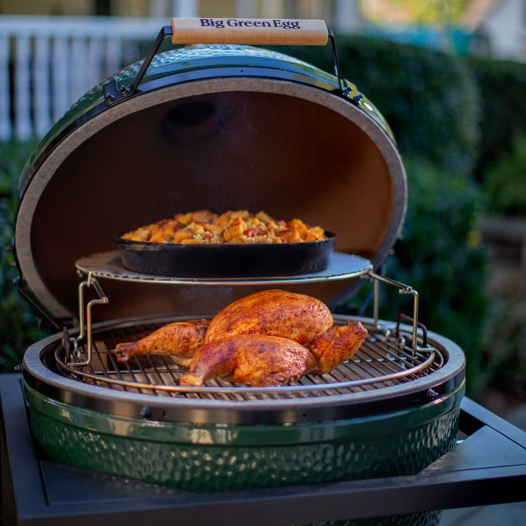 BigGreenEgg's tweet photo. The EGGspander is the perfect EGGcessory for cooking your Thanksgiving meal. With a spatchcock turkey on the bottom and dressing on top Thanksgiving has never been so easy. 

#BigGreenEgg #EGGspander https://t.co/Zt6FVOE5xD