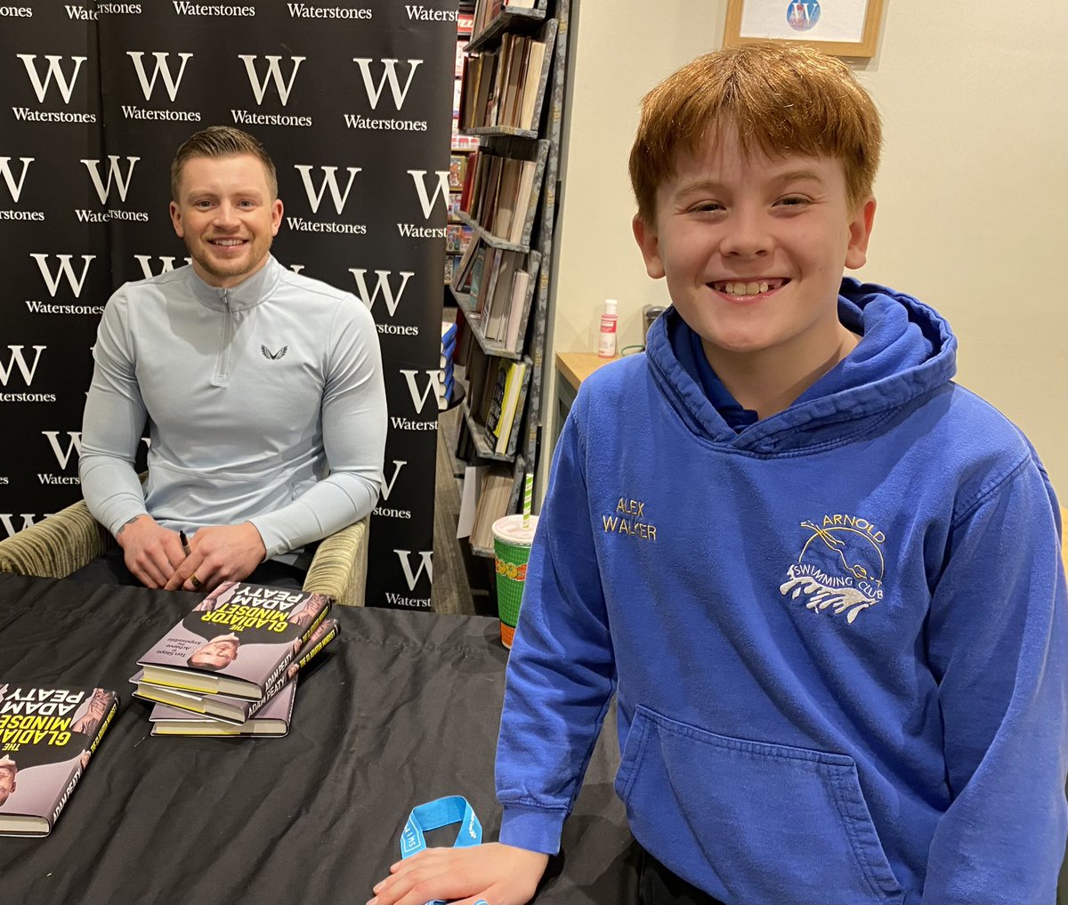 MattWalkerUK49's tweet photo. @adam_peaty It was great to meet you tonight! Thank you for the time you spent with Alex, Dan and Max at the Nottingham  book signing; just meeting you has inspired them to train harder and they’re already reading your book after swim training! Best of luck back in the pool! 💪🏻🏊🏻‍♂️ https://t.co/1MoIBXPxT9