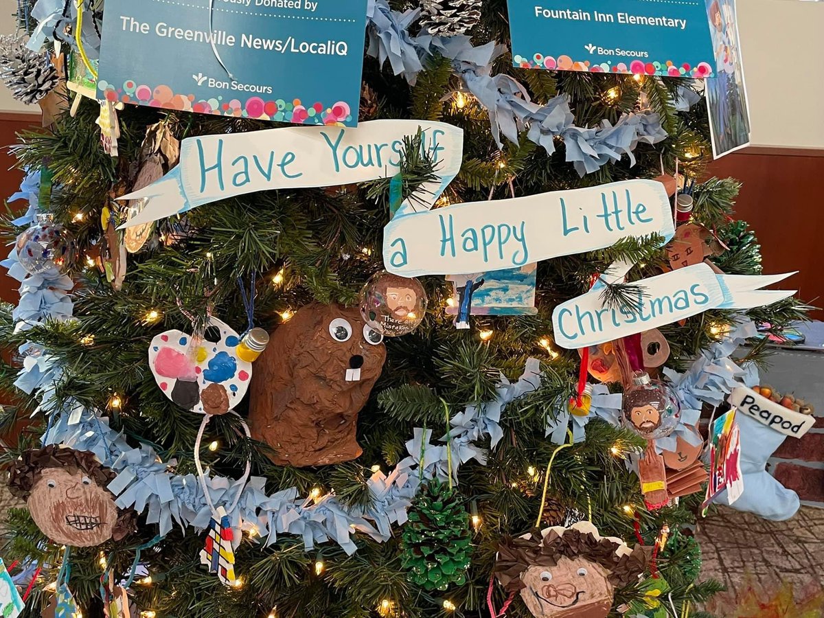 Art Teacher, Mrs.Cason got our Fountain Inn Elementary Christmas tree up at the Hyatt for the festival of trees! The kiddos have worked so hard making ornaments and used about 10 thousand pieces of tissue paper for Bob Ross’s hair!  We are so proud!!