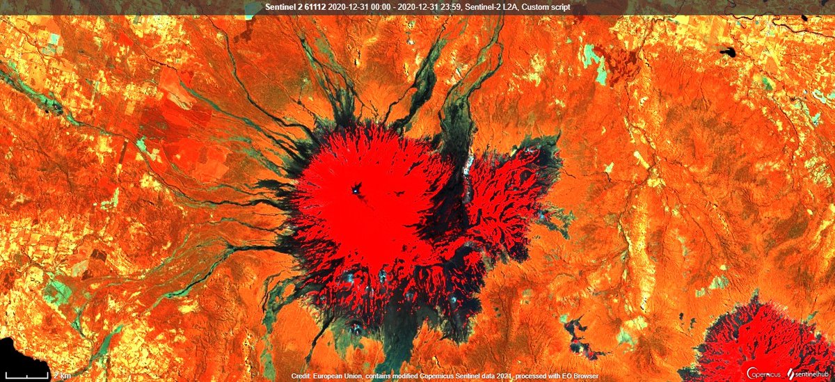 SHS_Space's tweet photo. #howthingshavechanged data can now be downloaded in seconds and processed on PCs or cell phones. Sentinel-2 (31-Dec-2020) of Volcan Villarrica🌋only 35 years apart. Snow is bright red in both Landsat previous Tweet and Sentinel images (Data @sentinel_hub & @ESA_EO) 2/2 https://t.co/q06SMgsOJZ