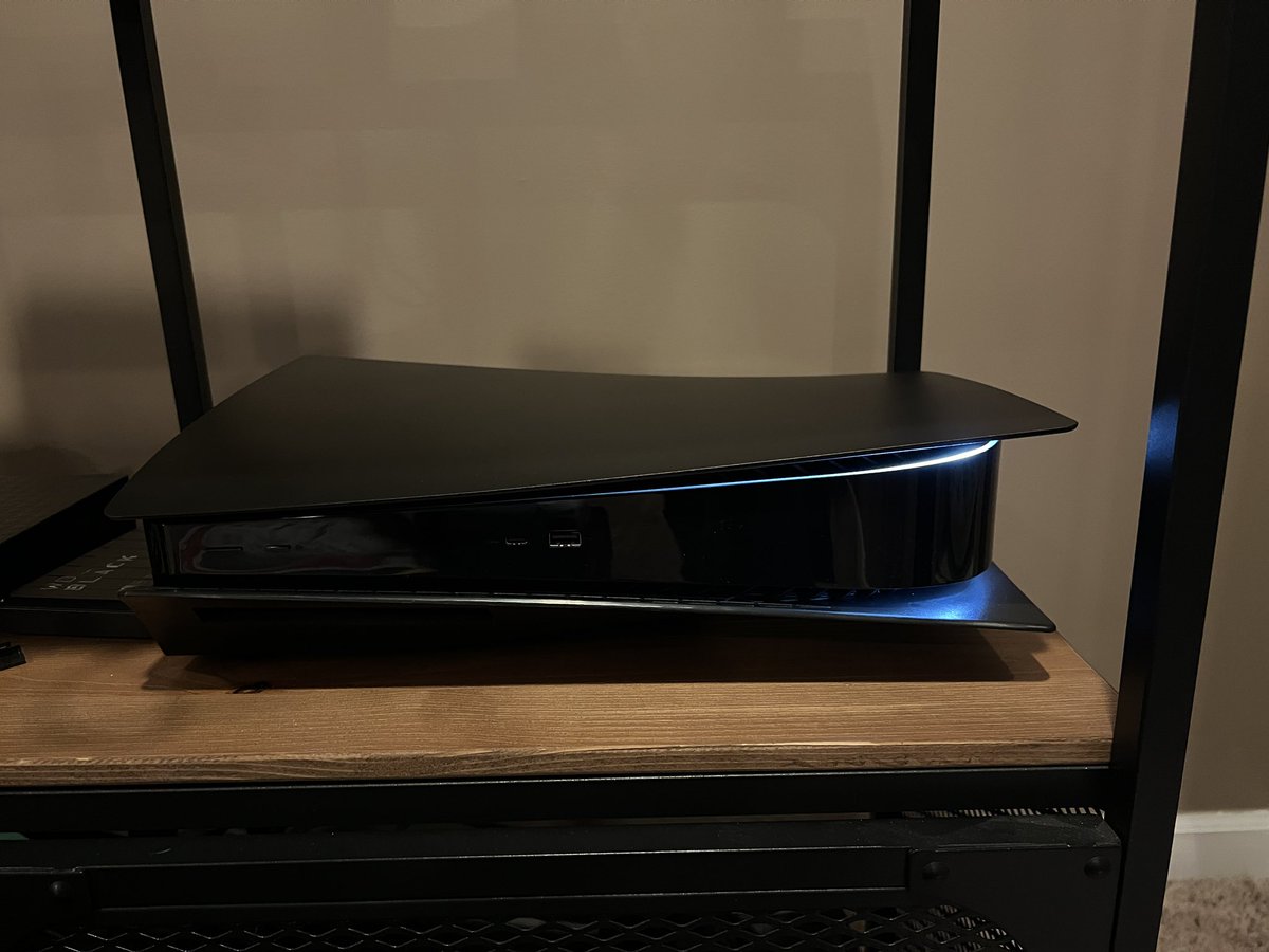 Movie_Mikie's tweet photo. I decided to add red  @ToastyStickers my PS5. I took pictures of the before, the after and the after with no lights on.  The picture with lights off doesn’t really show the true red color. It looks perfect. They are super easy to install.#toastystickers https://t.co/xpaudyJa9O