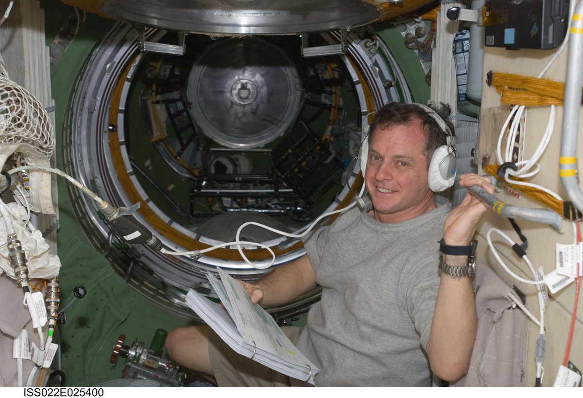 View of T.J. Creamer, Expedition 22 Flight Engineer (FE),uses a communication equipment in the Functional Cargo Block (FGB). Photo was taken during Expedition 22.