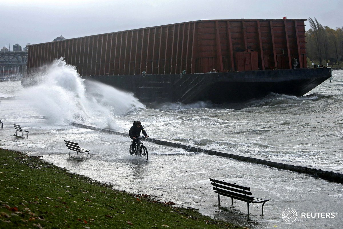 jwints's tweet photo. Vancouver cyclists take their rides very seriously. For @reuterspictures, this afternoon #BCStorm https://t.co/FUXPHOGHYt