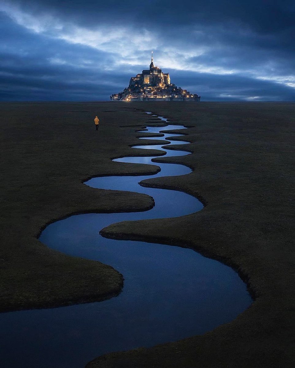 earth's tweet photo. Nighttime views of Mont Saint-Michel, France. https://t.co/dx2DApvnRe