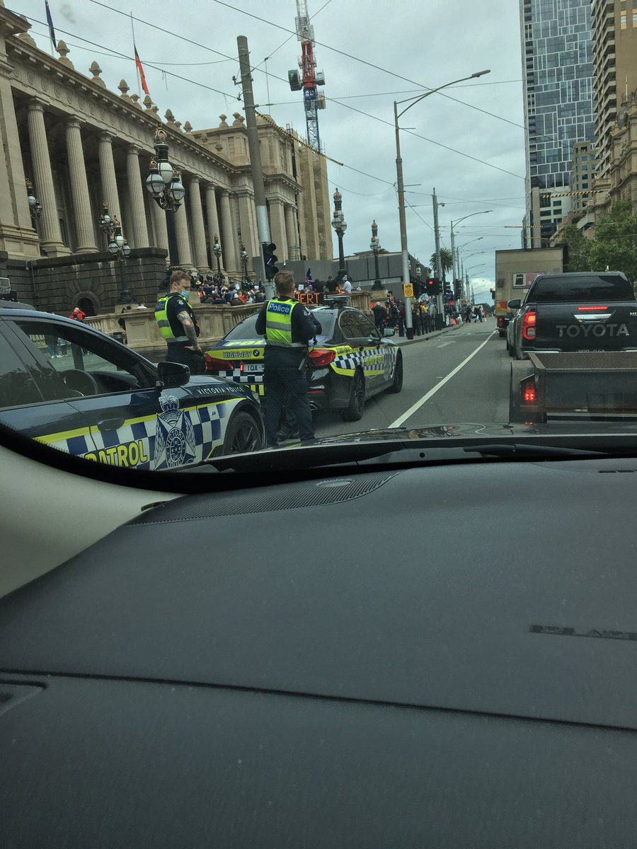 robynbryant33's tweet photo. Had cataract surgery in East Melbourne today so went past Parliament House on the way home. Plenty of police . About 500 protestors. I called out “I stand with Dan.”My husband said “You should have said “I’m a one eyed Dan supporter.” https://t.co/8FddgUlVTX