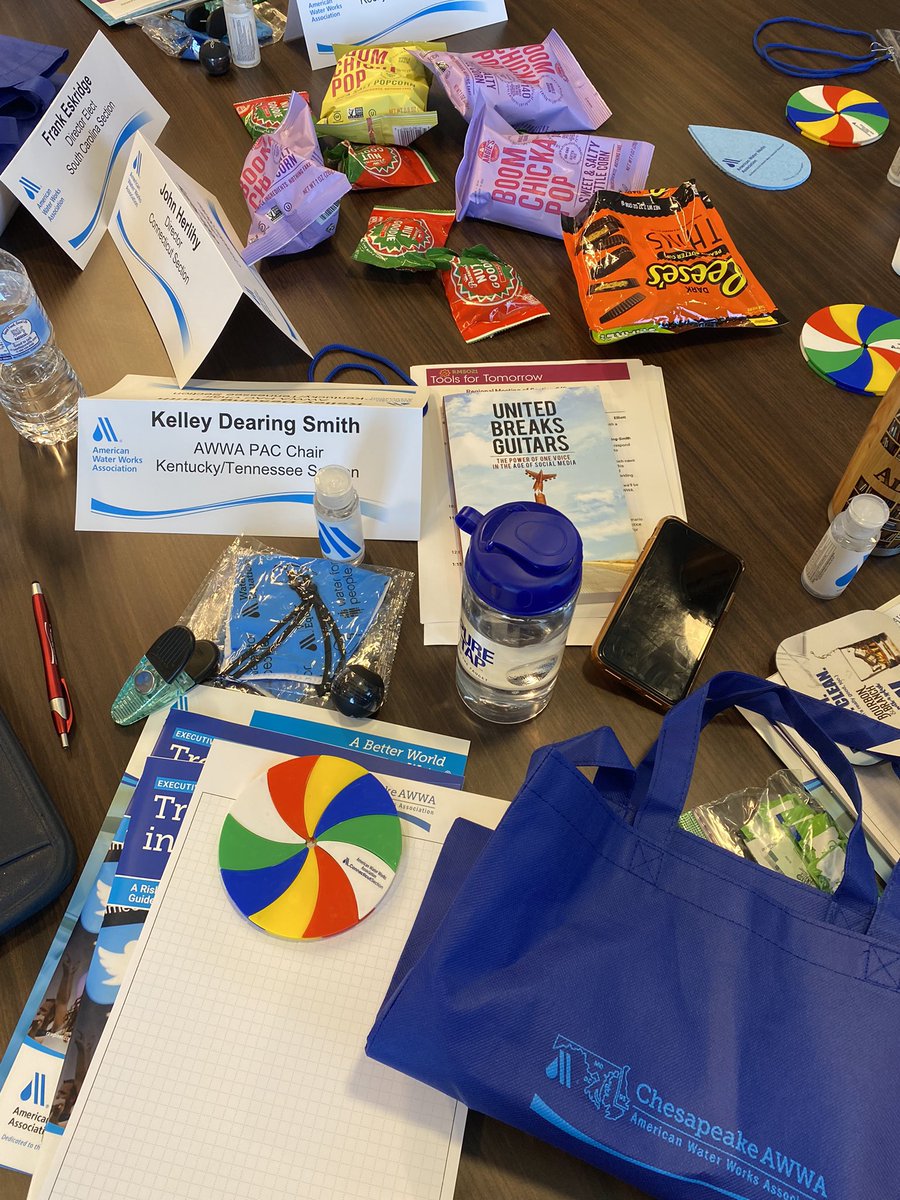 kelleydsmith's tweet photo. Chocolate, frisbees and masks. The table at an AWWA meeting. Locals bring fun items that represent their community. #SectionSharing https://t.co/i8vTpnJTA5