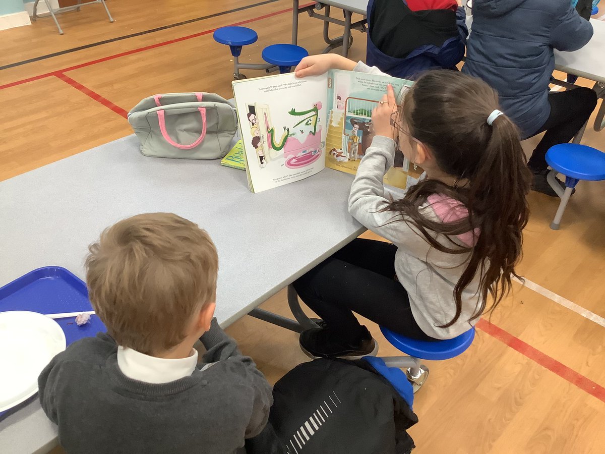 ReadingRocksCPS's tweet photo. Our Reader Leaders hosted a reading lunch in the dinner hall as part of our #BookWeekScotland celebrations. They read aloud to younger pupils and older pupils were welcome to bring their own books down to enjoy in the hall. 🍽📚 #cpsread https://t.co/iY3xvGdOp7