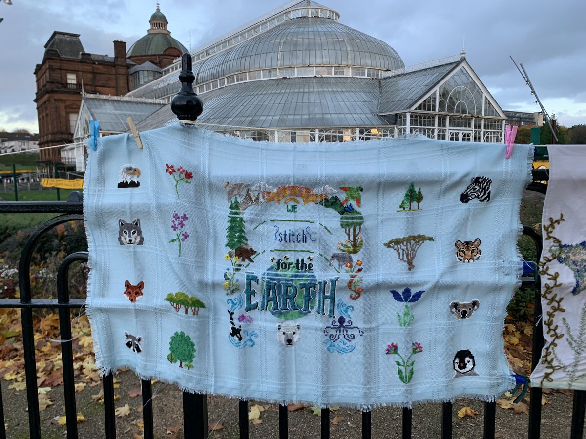 CraftingCOP26's tweet photo. One and a half miles of handmade panels to represent the goal of limiting global warming to 1.5 degrees celsius laid out in the #ParisAgreement https://t.co/V8scZlI2KK