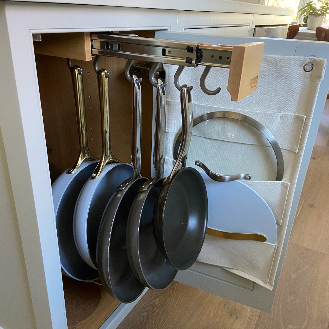 Cooking more often is all about convenience. When your pots and pans are easy to reach, you'll use them more often -- it's simple! We love this saute pan storage idea by <a href="/KMrenovate/">KraftMaster</a> 

Would you love to have this hidden hanger in your kitchen? 

#designerappliances #dainspired