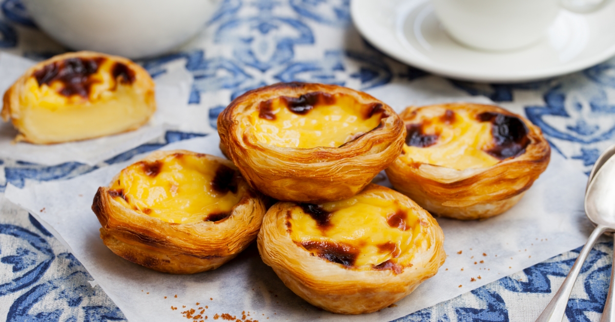 Anyone fortunate enough to have visited Portugal will tell you that Pastel de Nata is undoubtedly a must try!
A delicious flaky pastry case filled with creamy custard and topped with a sprinkling of cinnamon. 
#getinmybelly #holiday #portugal #belem #yumm #pasteldenata #travel