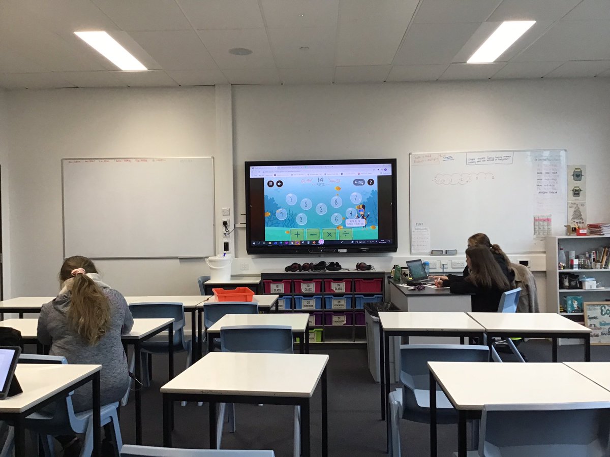 2D working on their problem solving skills doing the perplex puzzles by the open university