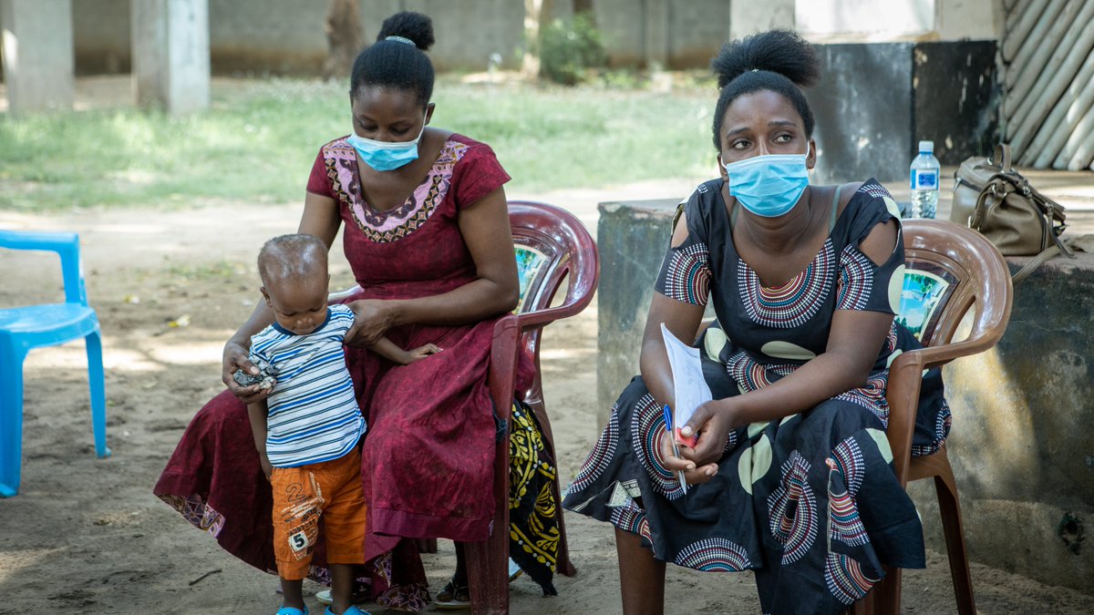 Two mothers at a listening group in Kilifi County, Kenya to learn about antimicrobial resistance.