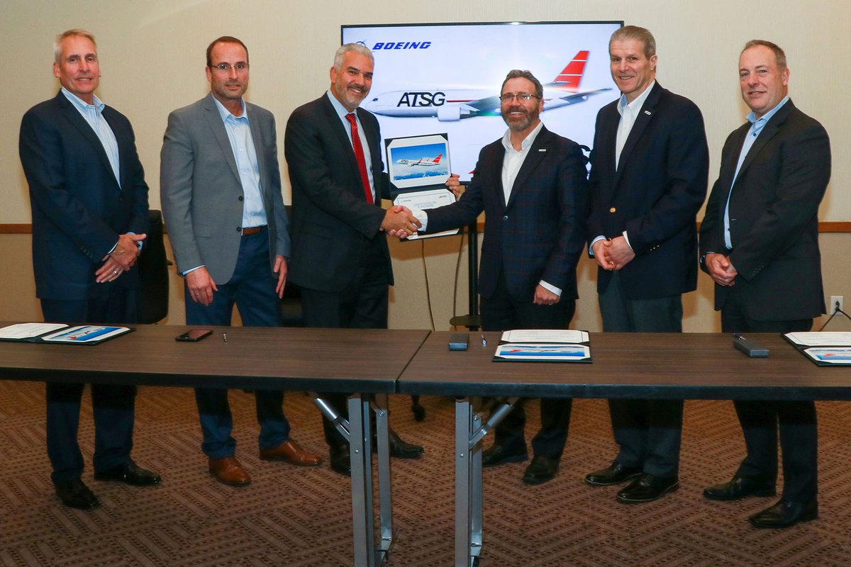 ATSGinc's tweet photo. ATSG's, Rich Corrado and Mike Berger took center stage at #ISTATAmericas yesterday signing an agreement with @Boeing for four 767-300 Boeing converted freighters. The first of these conversions will induct in August of 2022.

#AirCargo #Boeing $ATSG #ConvertedFreighter #767 https://t.co/wxTT1vQOkz