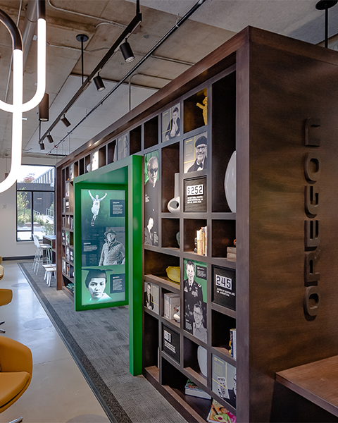 adventresults's tweet photo. The Student Welcome Center @uoregon is one-of-kind, just like the Ducks. It rewards curiosity and is full of surprises: oversized gear walls, treasures in lockers, an enchanted book, Easter Egg moments in the alumni library. #GoDucks #movepeople #storytelling https://t.co/DUh8vJEzFM