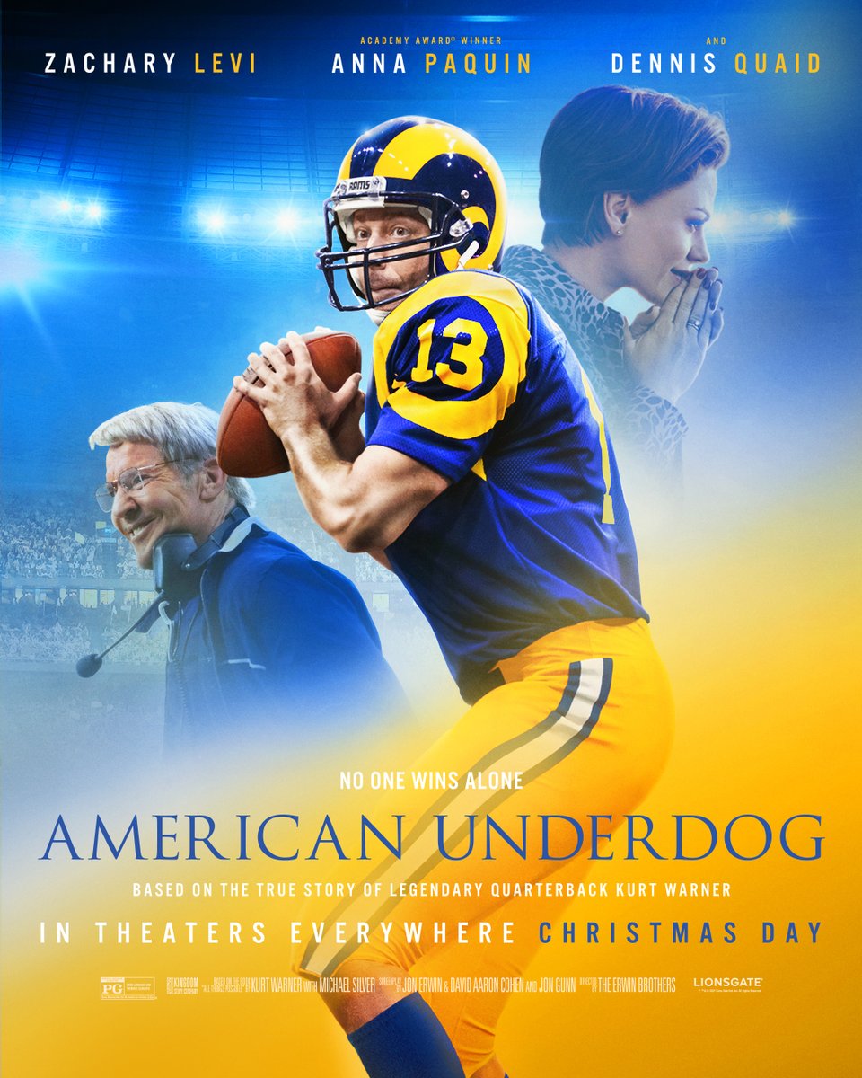 Zachary Levi as Kurt Warner holds a football on the poster for the movie American Underdog. Anna Paquin and Dennis Quaid are featured behind him.